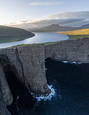 Sorvagsvatn or Leitisvatn lake, cliffs and the sea below on Vagar island, Faeroe islands, Denmark, Europe